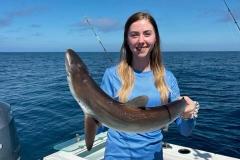 Girl-Holding-A-Shark