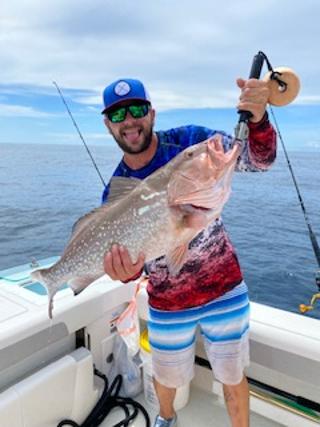 Fishing On A Boca Grande Fishing Charter And Catching Grouper Fishing On A Boca Grande Fishing Charter And Catching Grouper